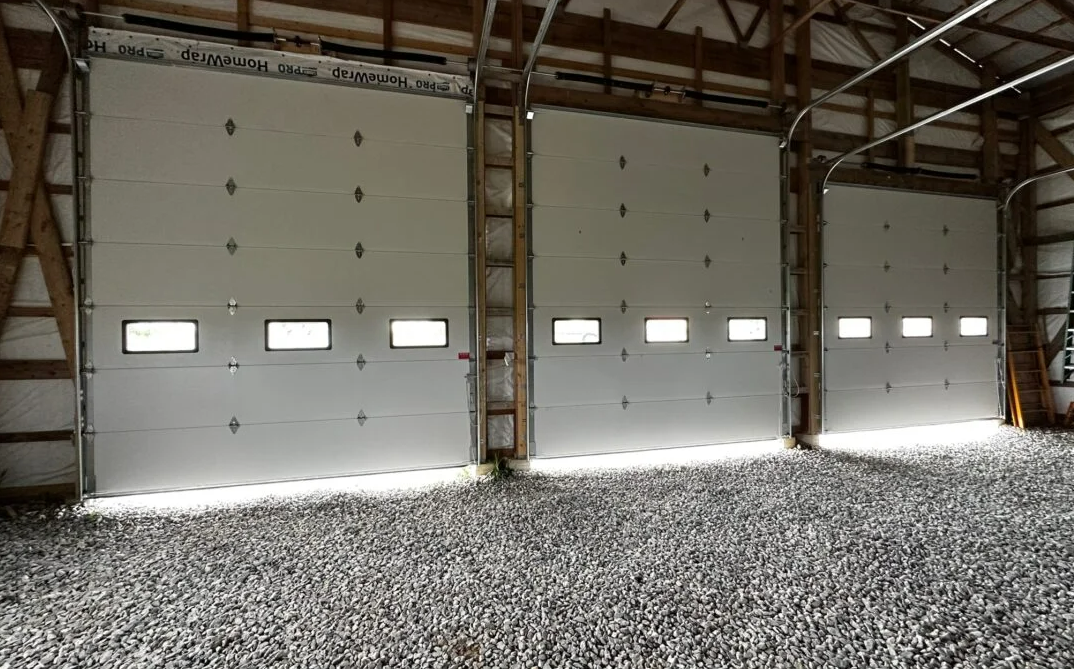 Technician performing professional garage door repair service at a residential property in Dublin