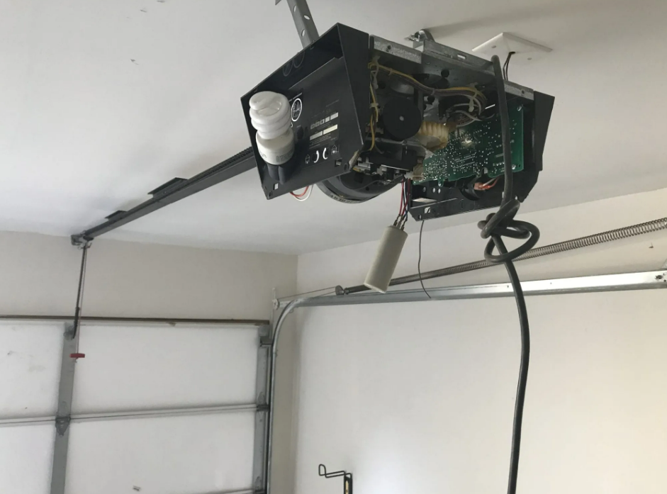 a technician performing a garage door opener repair, highlighting the hands-on service offered by Dublin Garage Door Repair.