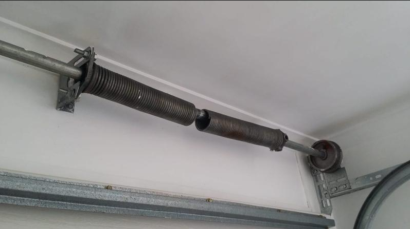 Emergency overhead garage door equipment and spring installation layout for Ashville emergency service